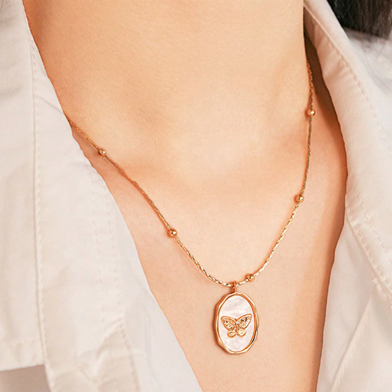 Butterfly locket necklace