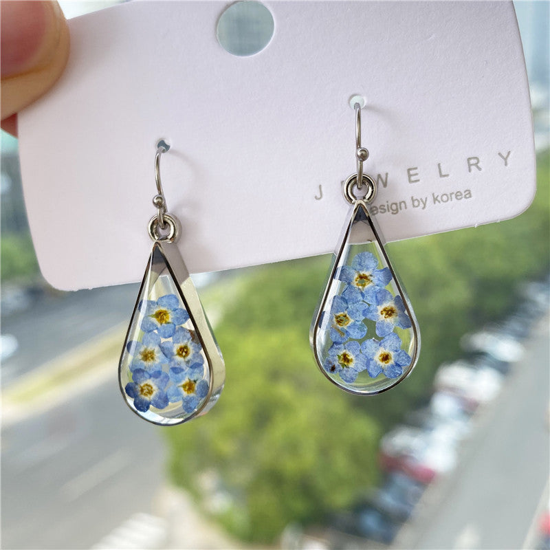 Blue teardrop flower earrings
