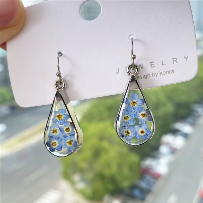 Blue teardrop flower earrings