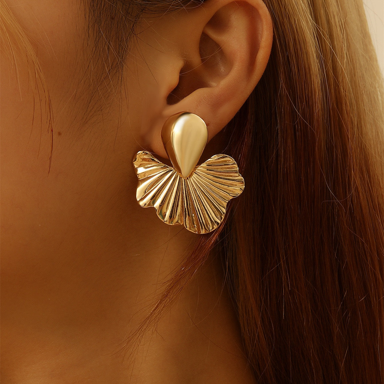 Gold flower earring