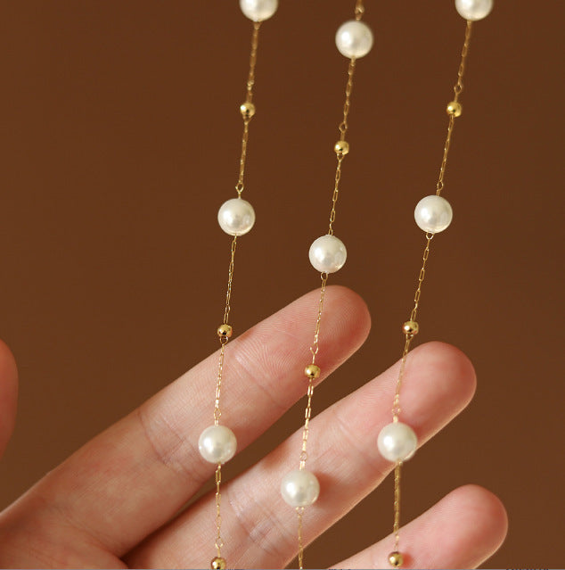 Simple sorted pearl necklace