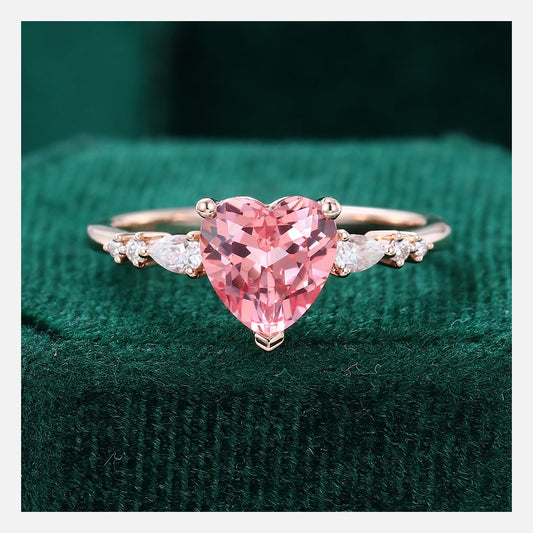 Heart cut pink monzonite engagement ring