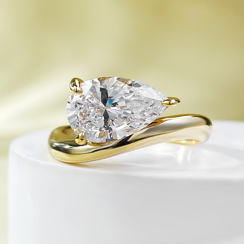 Pear Cut Lab Created Sapphire Ring in 18K Gold Plated Silver